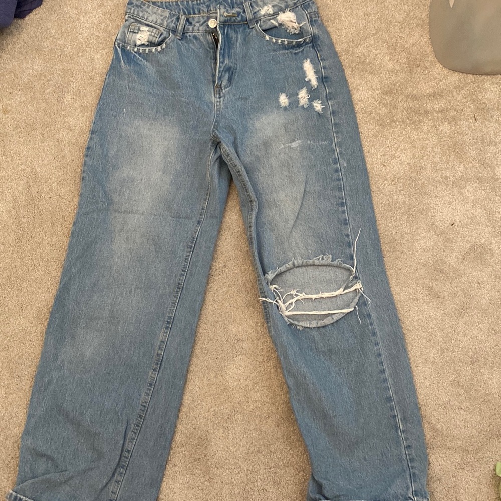 Ripped blue jeans